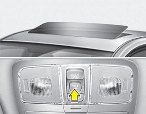 To open the sunroof (autotilt feature), press the tilt button (2) on the overhead