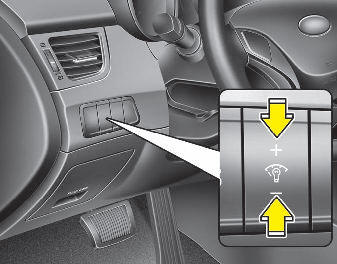 When the vehicle’s parking lights or headlights are on, press the upper or lower