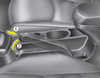 To release the parking brake, first apply the foot brake and pull up the parking